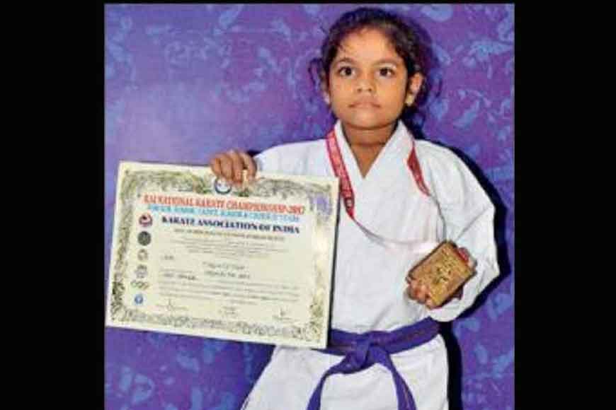 &nbsp;Eight-year-old karate champ fetches gold for country
